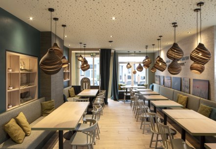 Gemütliches Ambiente im Café U in Daun, © Pioniere & Wegweiser GmbH Gemütliches Ambiente im Café U in Daun, © Pioniere & Wegweiser GmbH