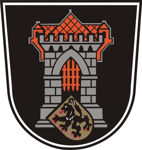 Een wapen met een grijze toren en een rode dak. Daaronder bevindt zich een schild met een leeuw.