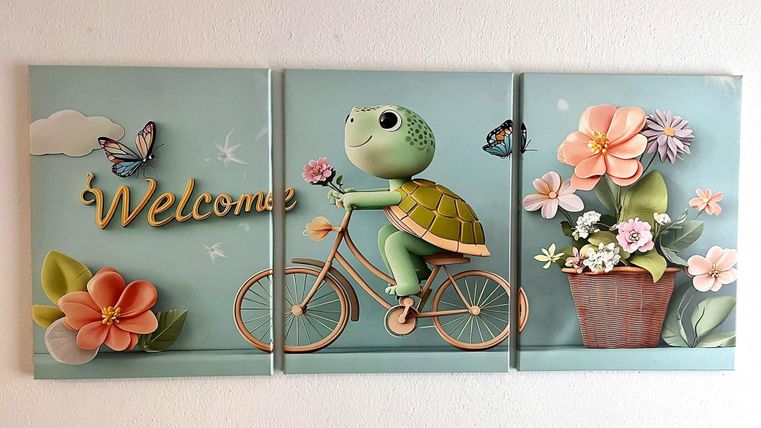 A cute turtle is riding a bicycle and greets with the word "Welcome." Colorful flowers and butterflies adorn the cheerful picture.