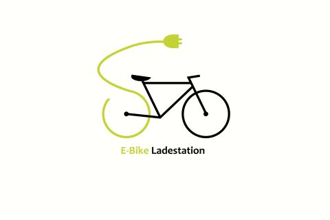 A simple graphic of a bicycle with a charging cable. It shows an e-bike charging station.