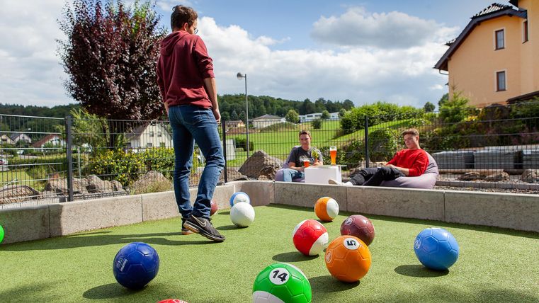 Football billiards with people