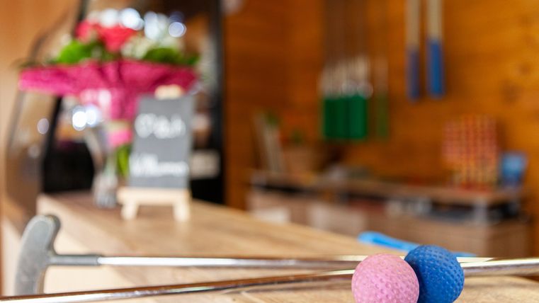 Mini golf clubs on the counter