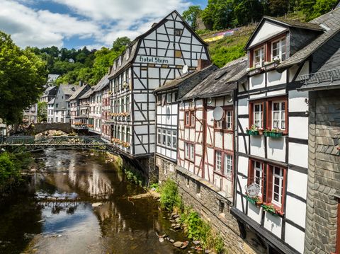 Half-timbered houses along a river in Monschau.