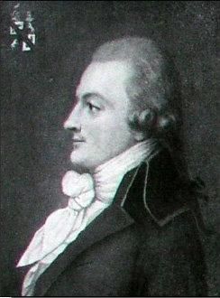 A portrait of a man in profile with neatly styled hair and an elegant suit. He is wearing a bow tie and has a pensive expression.