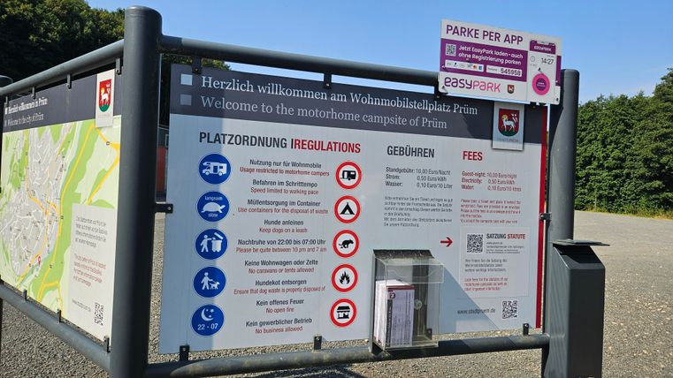 Seating arrangement, information board for the camper parking area