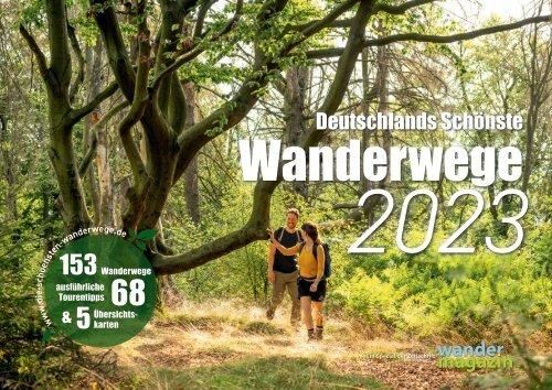 Een mooi bospad met een stel dat aan het wandelen is. Weelderige groene bomen en een uitnodigende natuurlijke omgeving.