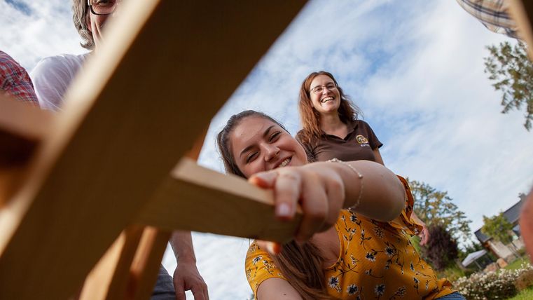 playing children with wooden element