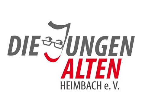 De afbeelding toont het logo van "Die Jungen Alten Heimbach e. V.". Het bevat de tekst in grijs en rood, vergezeld van een gestileerde gezichtsillustratie met een bril.