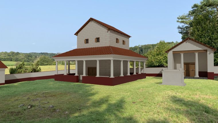 Rekonstruktion eines römischen Umgangstempels mit roten Ziegeldächern und Säulen, umgeben von grüner Wiese und Bäumen im Hintergrund.