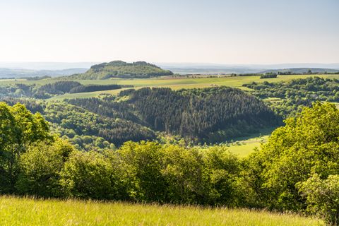 Sweeping views of a green, hilly landscape
