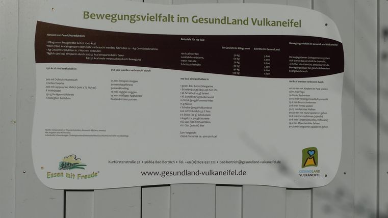 An information board about movement offers in GesundLand Vulkaneifel. It contains a list of activities and contact information.