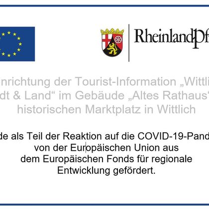 An informational sign about the Tourist Information office in Wittlich. The project was funded by the European Union.