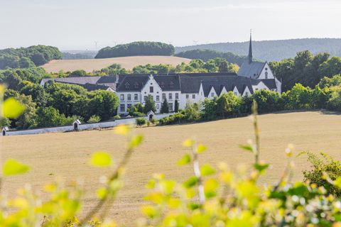 View of the Mariawald Monastery surrounded by summer nature