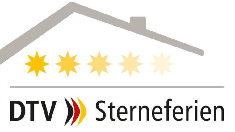 A logo for DTV Sterneferien. It features a stylized house with four star categorizations.
